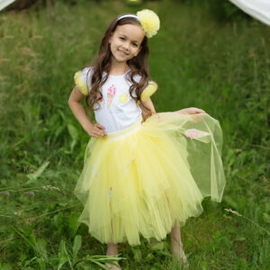 Yellow Tulle Skirt Set with white t-shirt and yellow, red, green and blue ice-lollies patterned on the front of the top. Skirt set is being worn by child with brown hair.